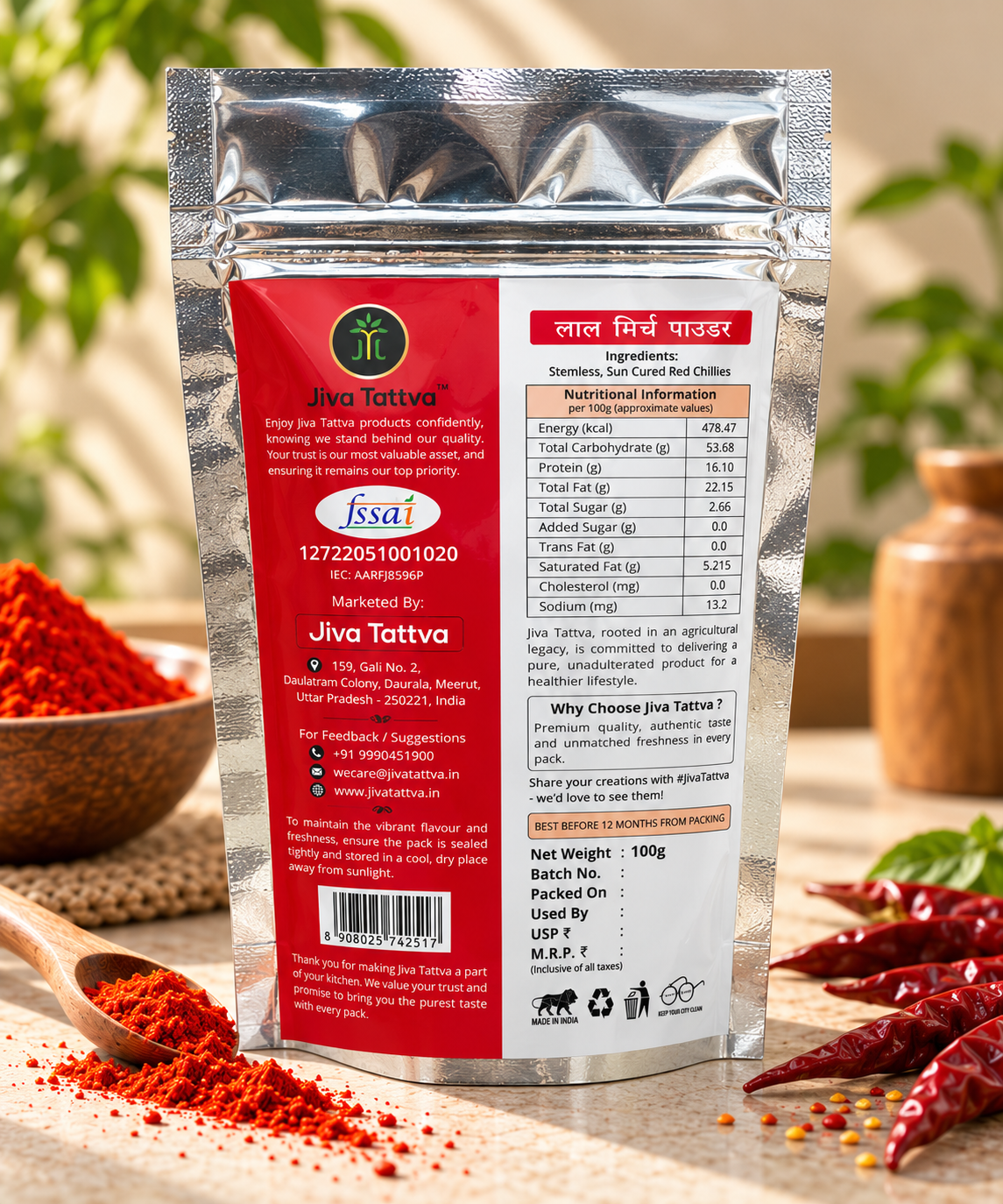Back view of Jiva Tattva Red Chilli Powder 100g pouch showing ingredients, nutritional information, storage instructions and packaging details