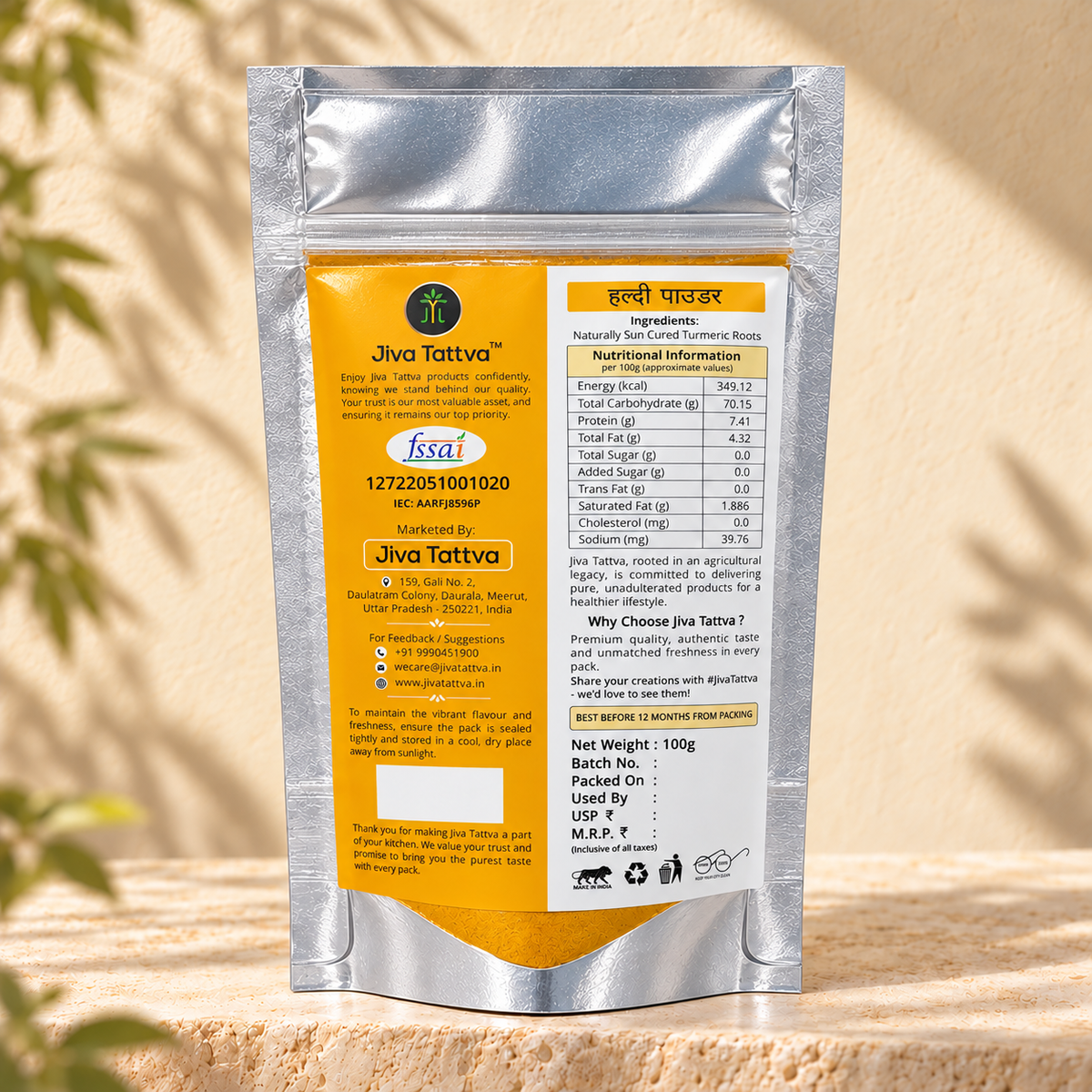 Back view of Jiva Tattva Turmeric (Haldi) Powder 100g pouch showing ingredients, nutrition and storage information